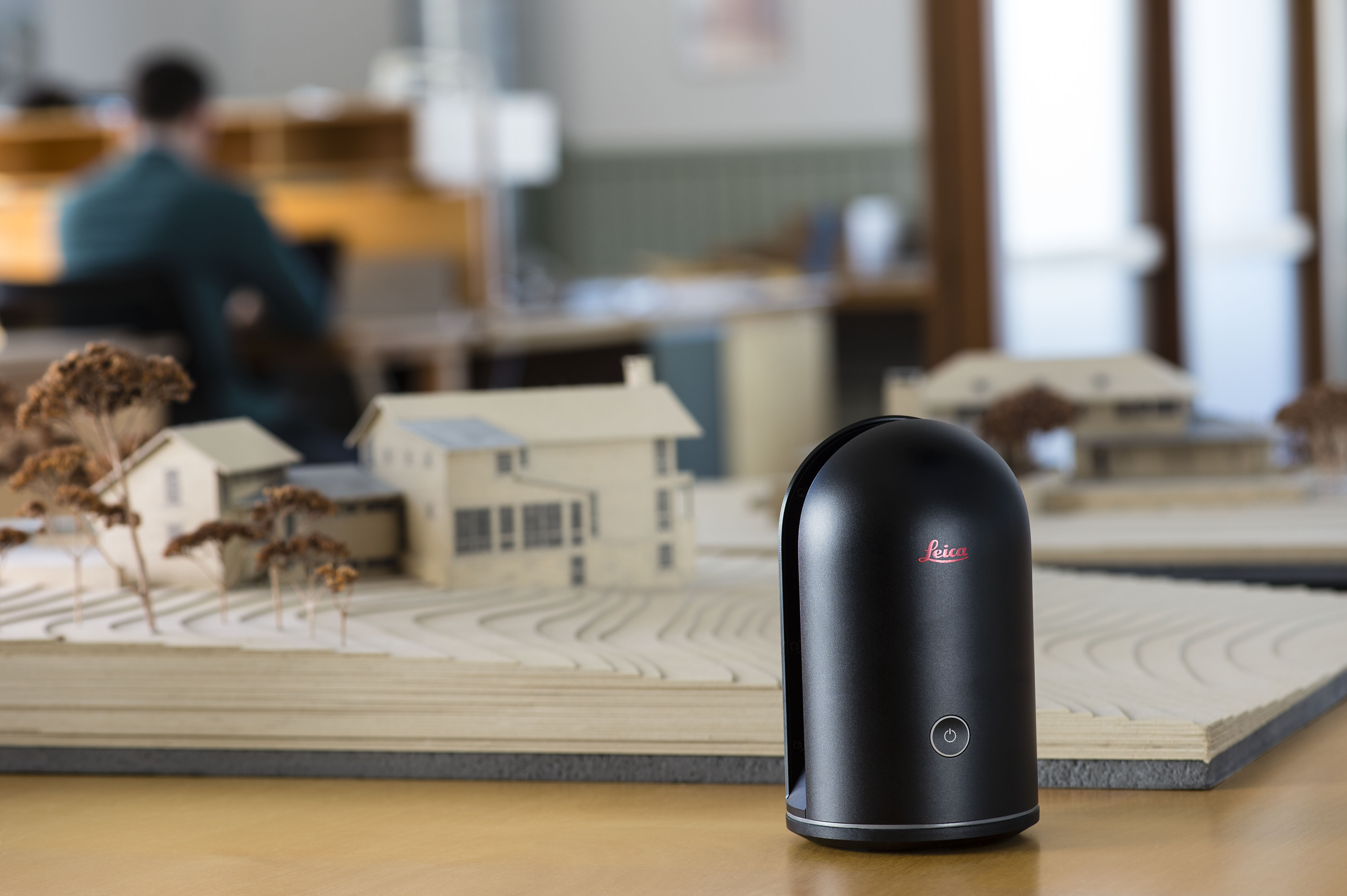 Leica BLK360 in front of an architectural model