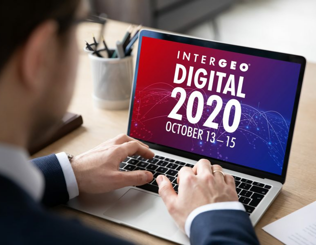 Man in a suit viewing Intergeo Digital 2020 on a laptop
